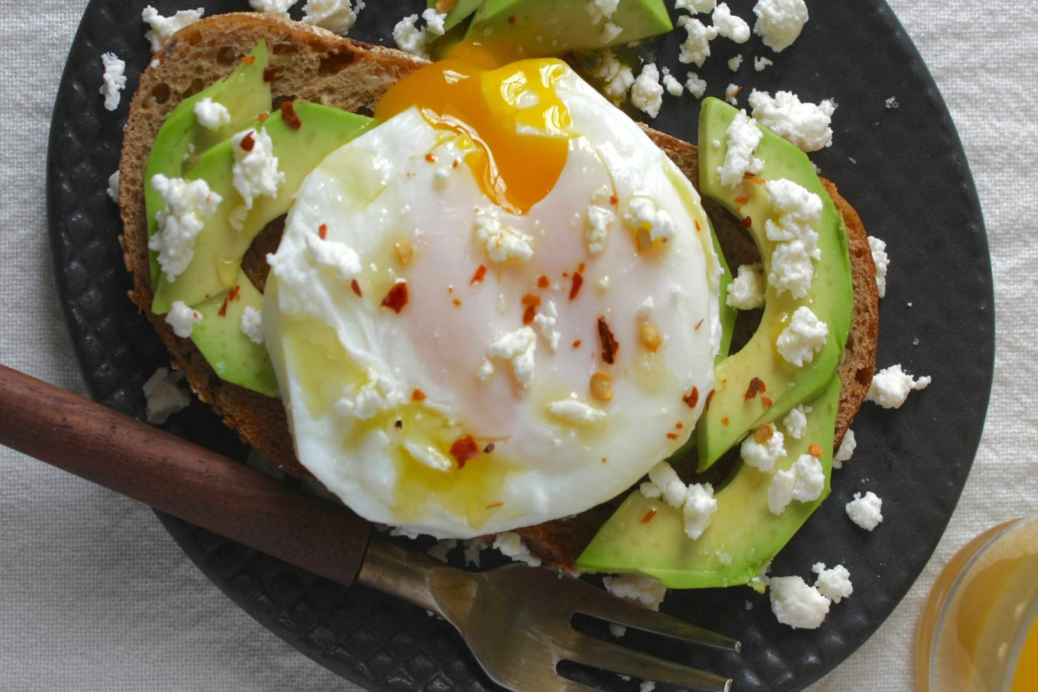 Kosterina's Avocado Toast with a Poached Egg & Crumbled Feta