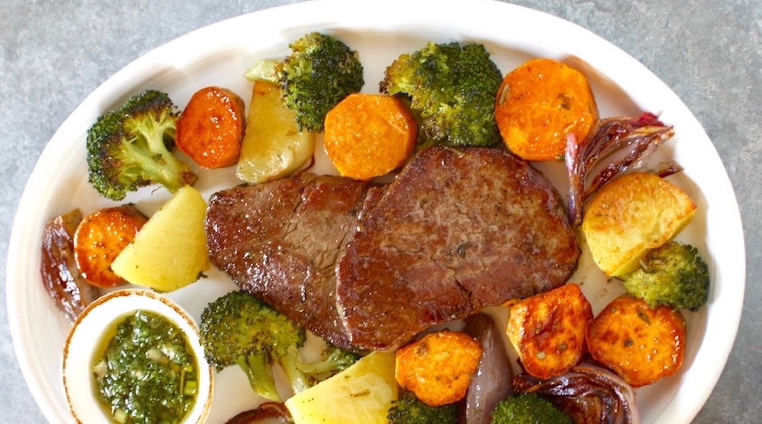 Pan-Seared Beef Medallions with Roasted Veggies + Fresh Herb Sauce