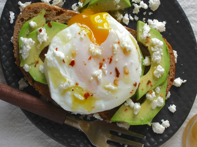 Kosterina's Avocado Toast with a Poached Egg & Crumbled Feta