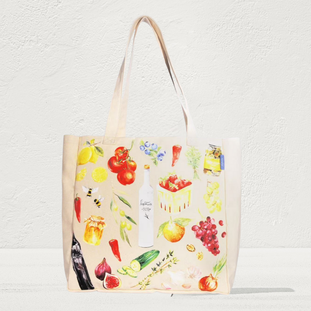 Tote bag with colorful fruit and vegetable pattern on a white background